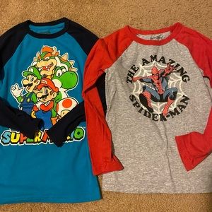 2 boys size 8 long sleeve character shirts